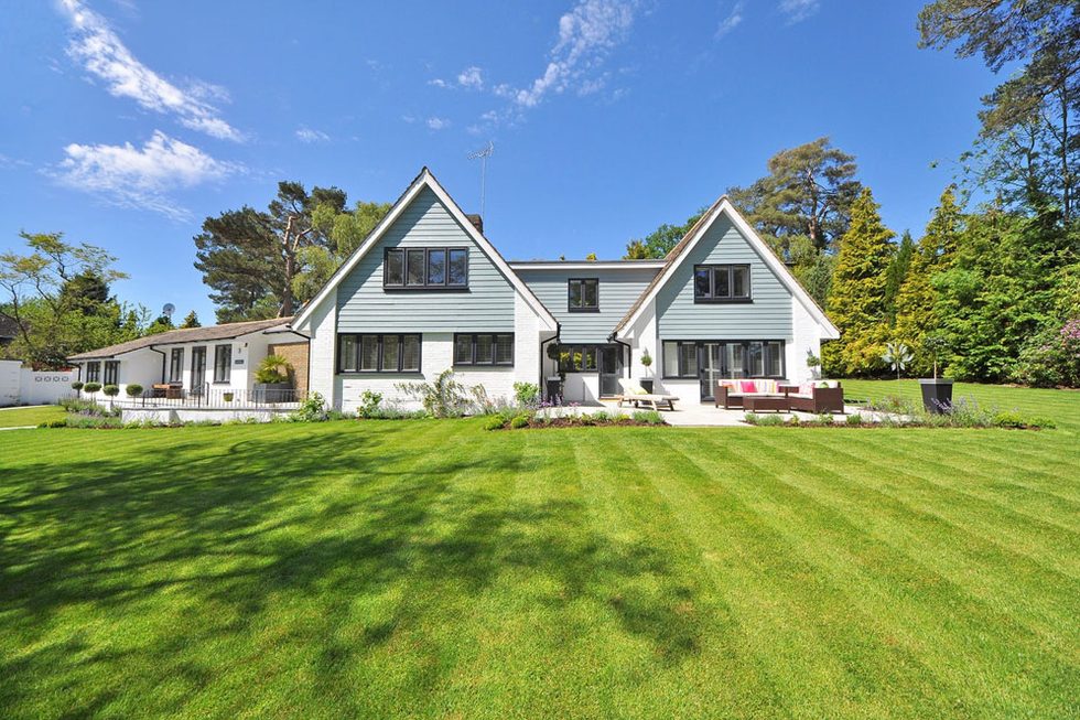 House behind a wide, freshly cut lawn